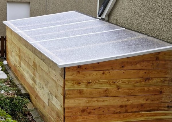 pose de toit transparent